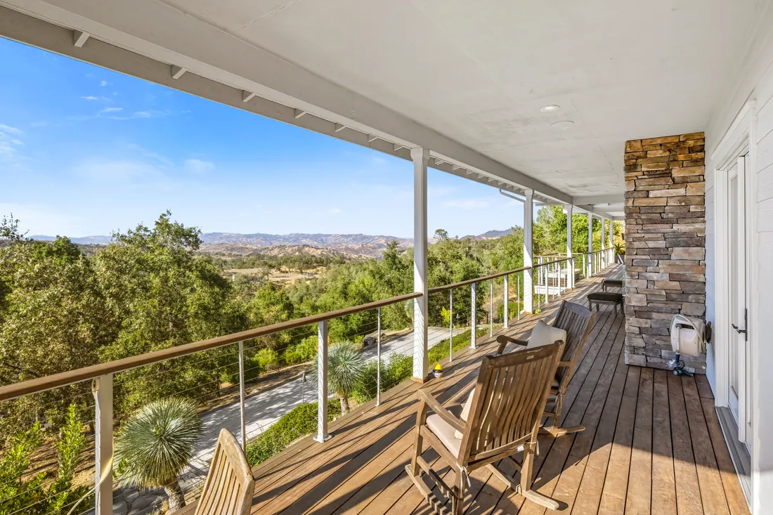 90 Longhorn Ridge Road &ndash; Covered porch with fireplace
